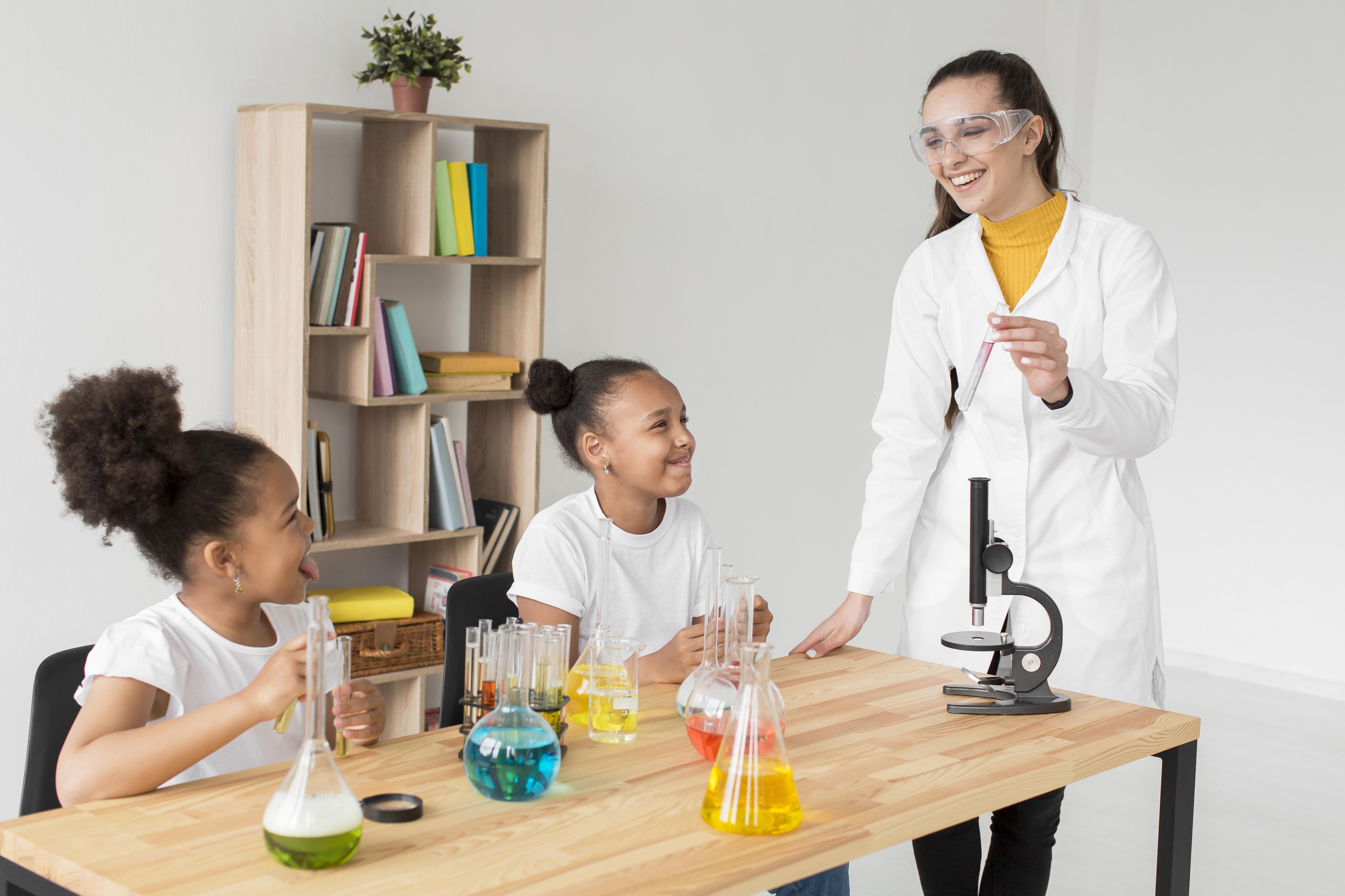 female-scientist-teaching-girls-about-science